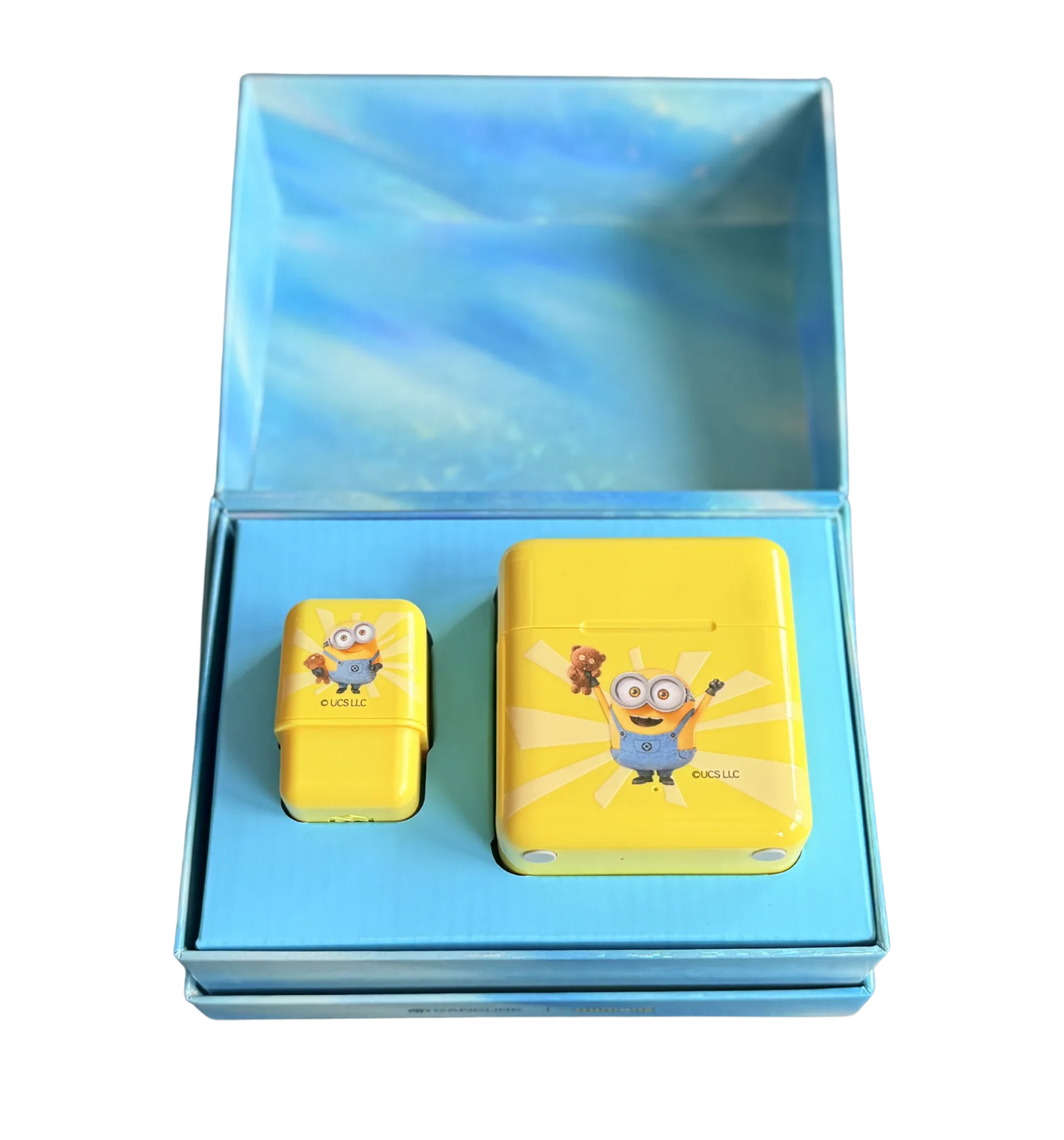 GAN i4 Minions Edition retail box opened, showing the Minions GanPod case and the storage box